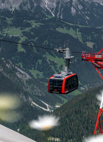 Bergbahn Gondel vom Lünersee, die gerade den Berg zum Lünersee hoch fährt | © Golm Silvretta Lünersee Tourismus GmbH Bregenz, Philipp Schilcher